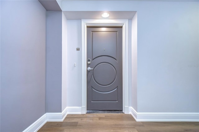 interior space with hardwood / wood-style flooring