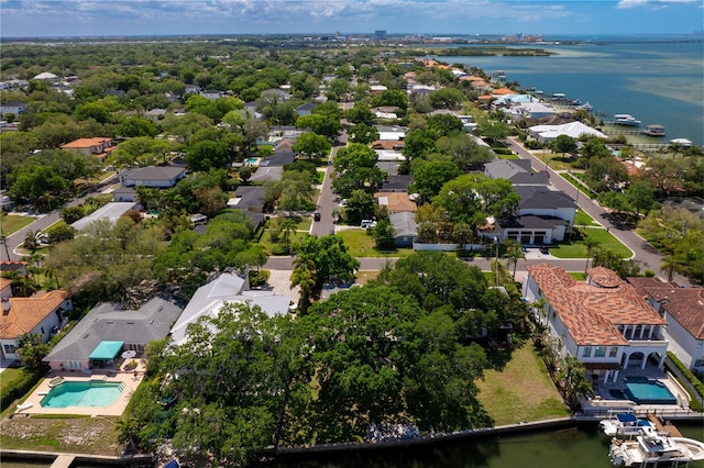 drone / aerial view with a water view