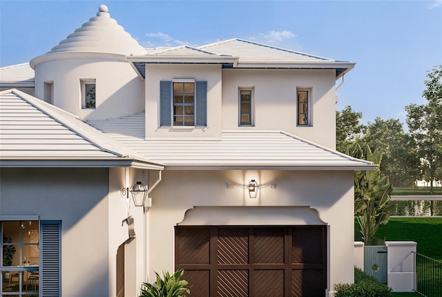 exterior space featuring fence and stucco siding