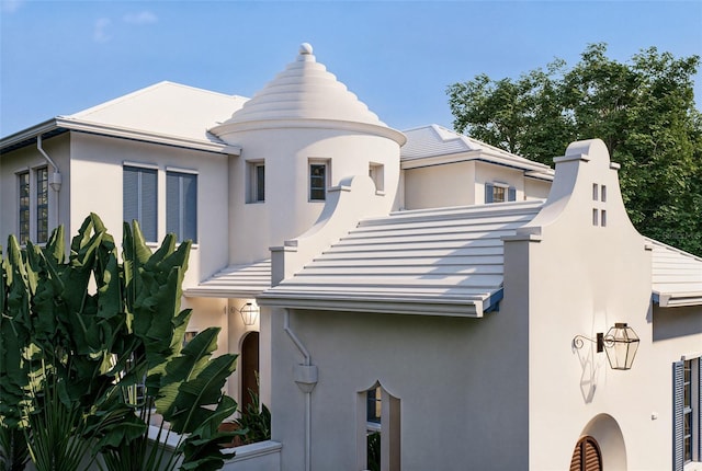 exterior space featuring stucco siding