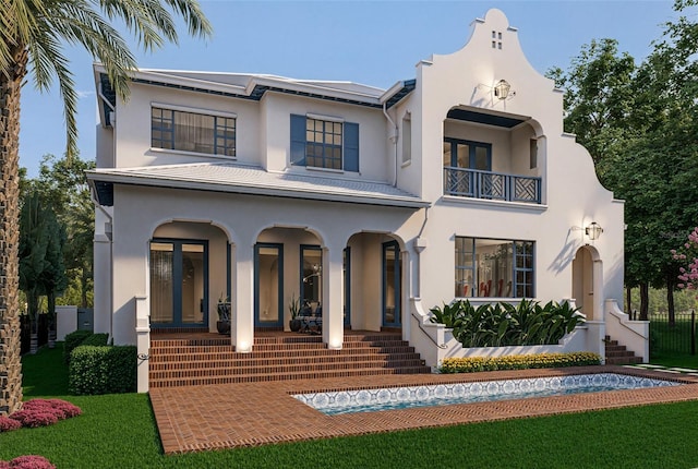 view of front of house featuring covered porch, a balcony, and stucco siding