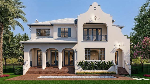 view of front facade featuring covered porch, fence, a balcony, and stucco siding