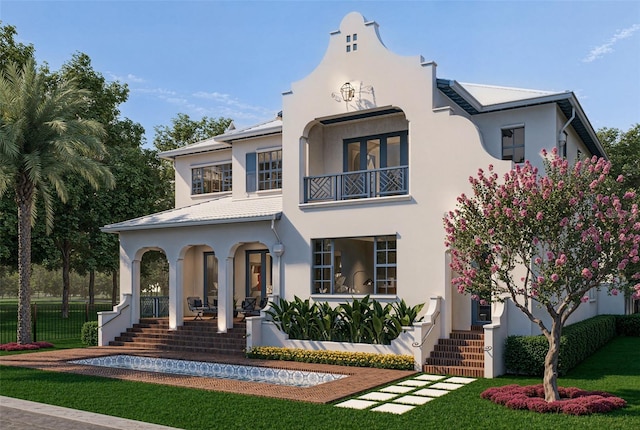 view of front of house with a balcony, a porch, and stucco siding