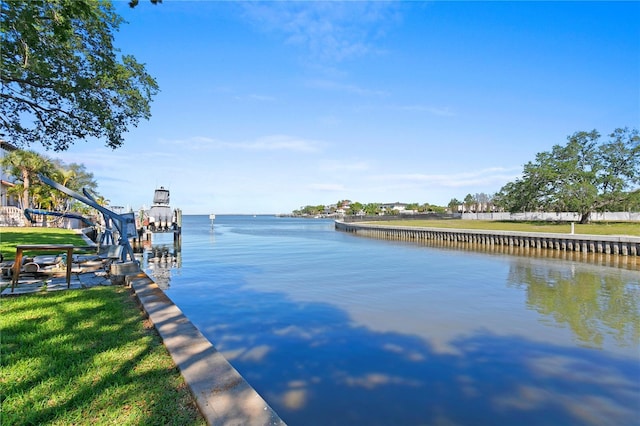 dock area featuring a water view and boat lift