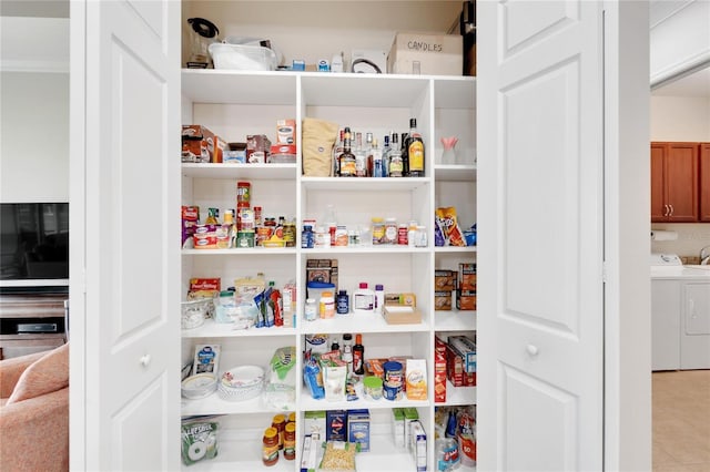 pantry with separate washer and dryer