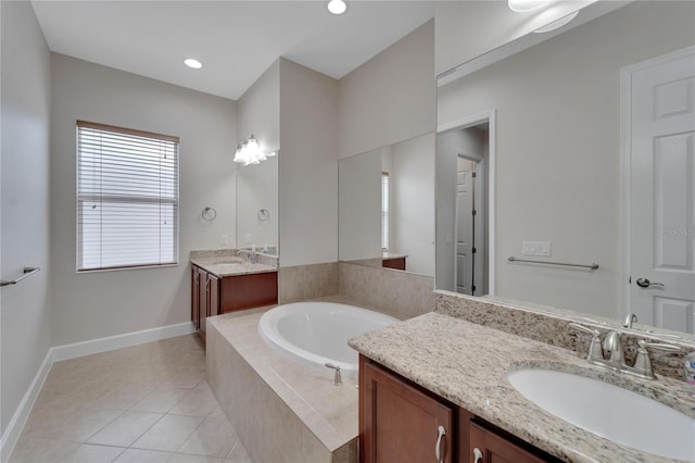 bathroom with a relaxing tiled bath, tile floors, and double vanity