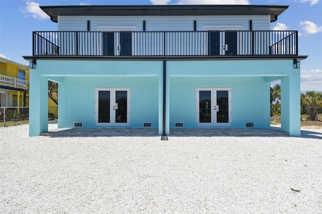 3230 Azalea Dr Lot 13, Hernando Beach, FL 34607 - back of house with a patio area, a balcony, and french doors