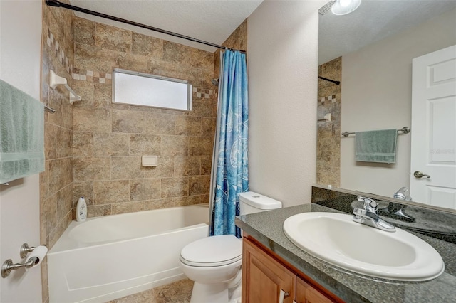 full bathroom featuring vanity, a textured ceiling, toilet, and shower / bath combo with shower curtain