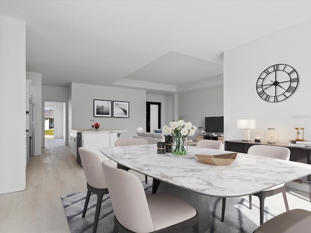 dining room with light hardwood / wood-style floors