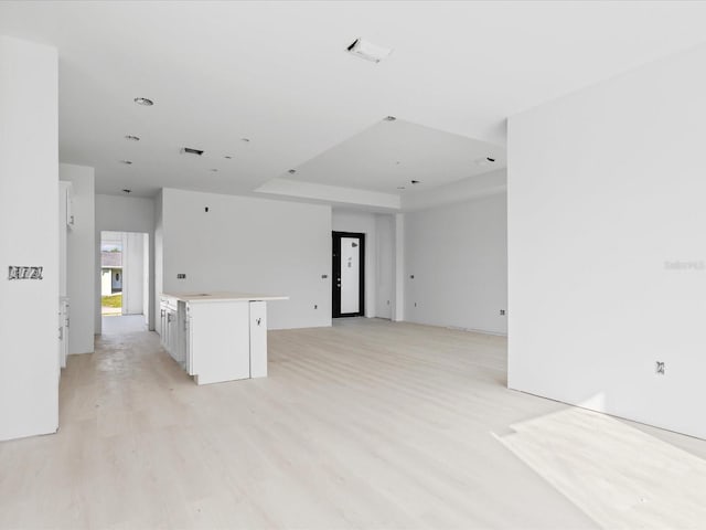 unfurnished room with light hardwood / wood-style flooring