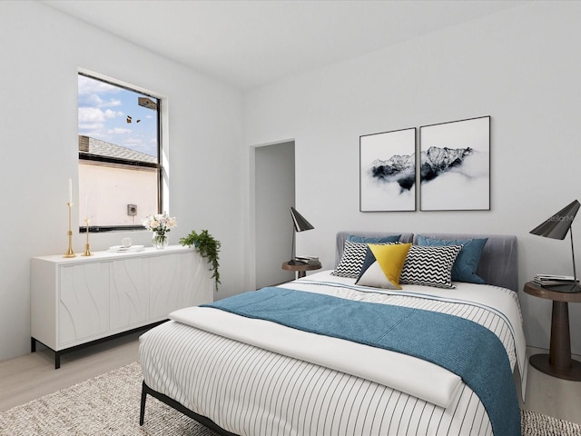 bedroom with light hardwood / wood-style floors