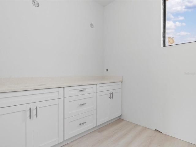 bathroom featuring hardwood / wood-style flooring