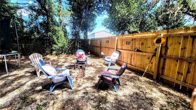 view of yard with a trampoline