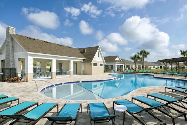 view of pool featuring a patio