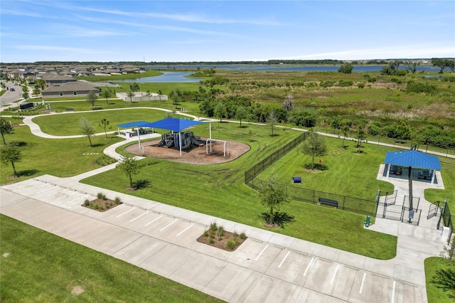 birds eye view of property featuring a water view