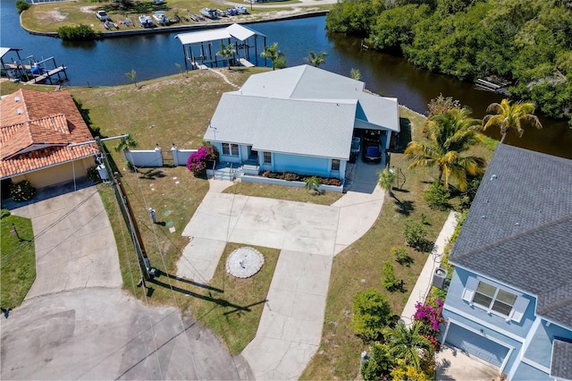 bird's eye view with a water view