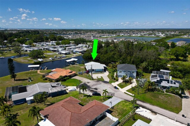 birds eye view of property featuring a water view