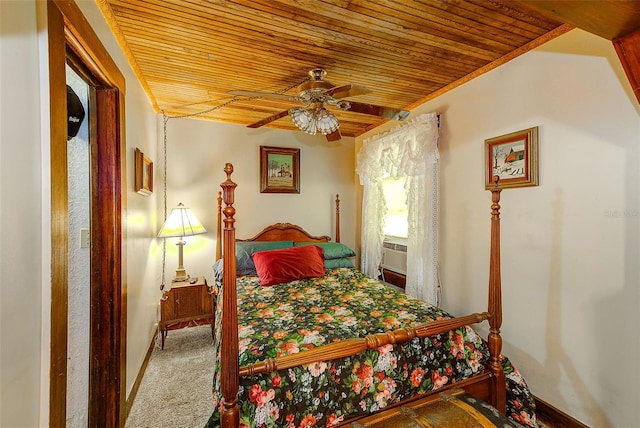 bedroom with wood ceiling, ceiling fan, and carpet