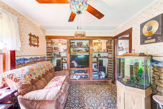 living room featuring crown molding and ceiling fan