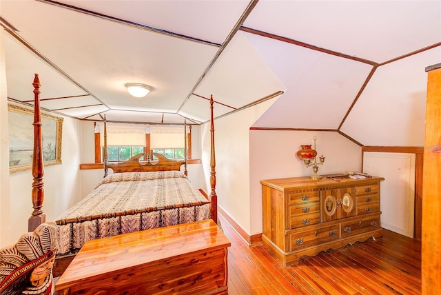 bedroom with hardwood / wood-style floors