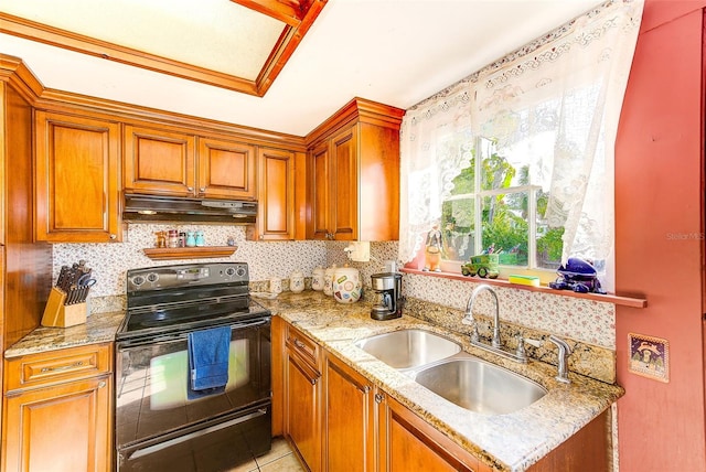 kitchen featuring electric range, sink, decorative backsplash, light stone counters, and light tile patterned flooring