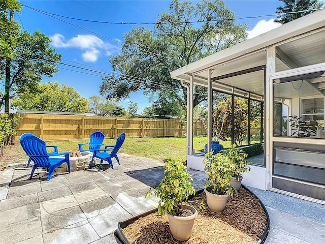 view of patio with a sunroom