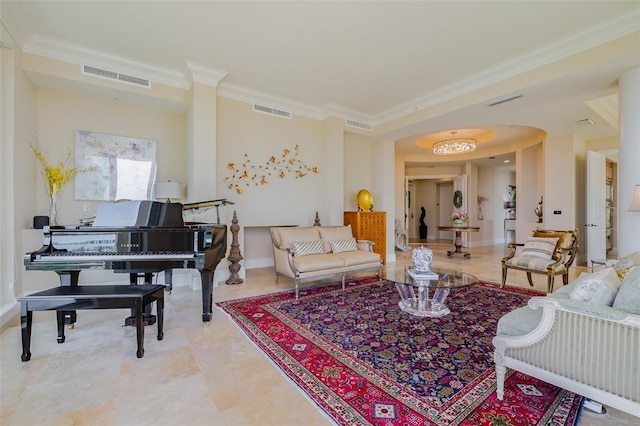 living room with a notable chandelier and ornamental molding