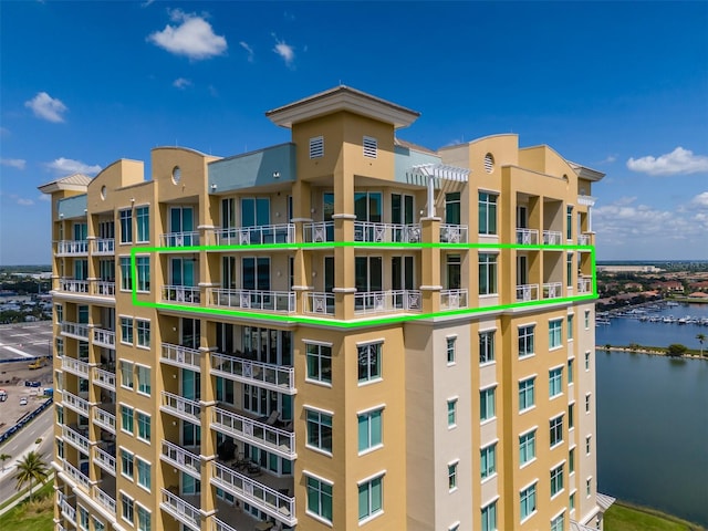 view of property with a water view