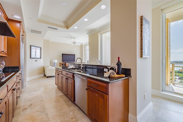 kitchen with dark stone counters, ornamental molding, sink, stainless steel dishwasher, and ceiling fan