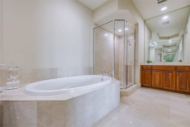 bathroom with vanity, separate shower and tub, and tile patterned flooring