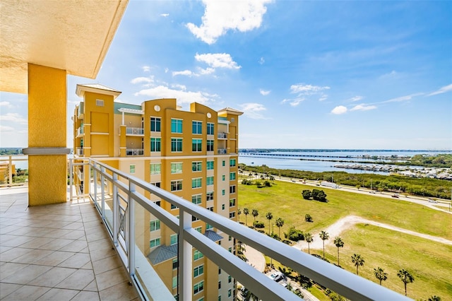 balcony featuring a water view