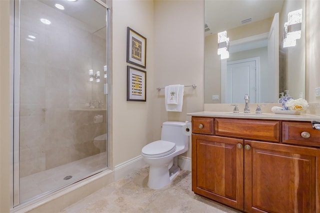 bathroom featuring vanity, toilet, and walk in shower