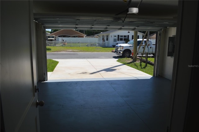 garage featuring a yard