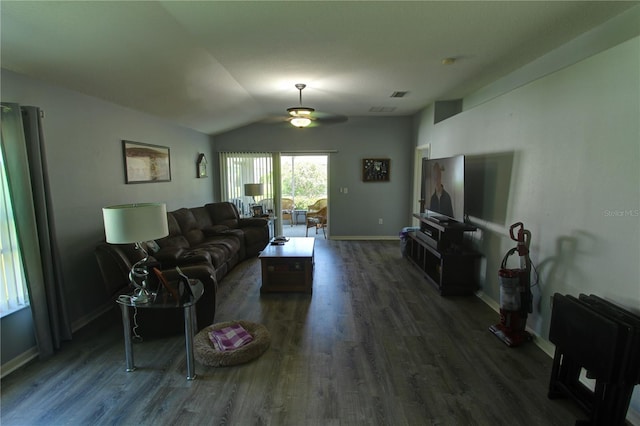 living room with dark hardwood / wood-style floors, ceiling fan, and lofted ceiling