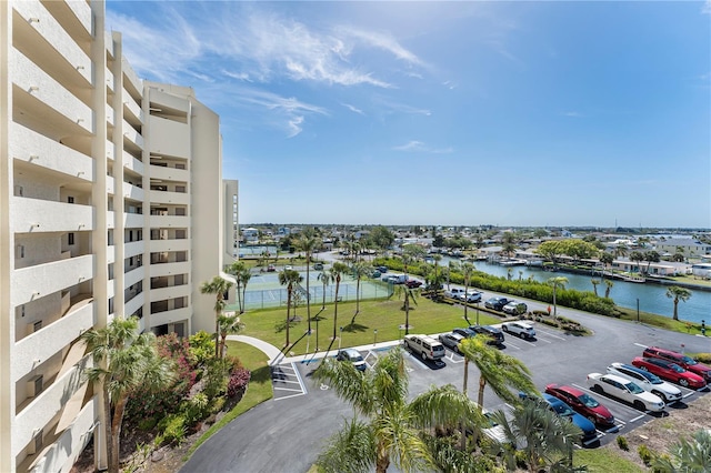 birds eye view of property with a water view