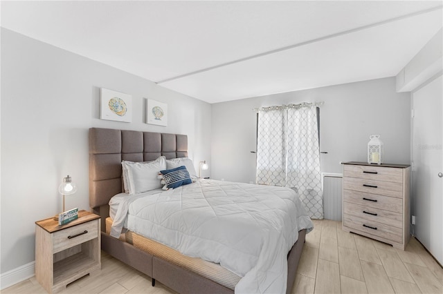 bedroom featuring light wood finished floors