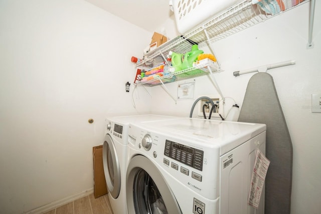 clothes washing area with washer and clothes dryer and hookup for a washing machine