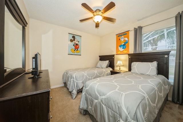 bedroom featuring carpet flooring and ceiling fan