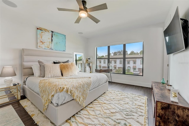 bedroom featuring wood-type flooring and ceiling fan