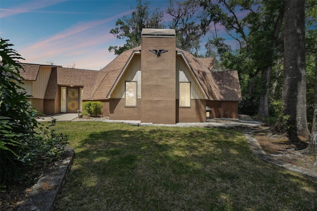 exterior space with a yard