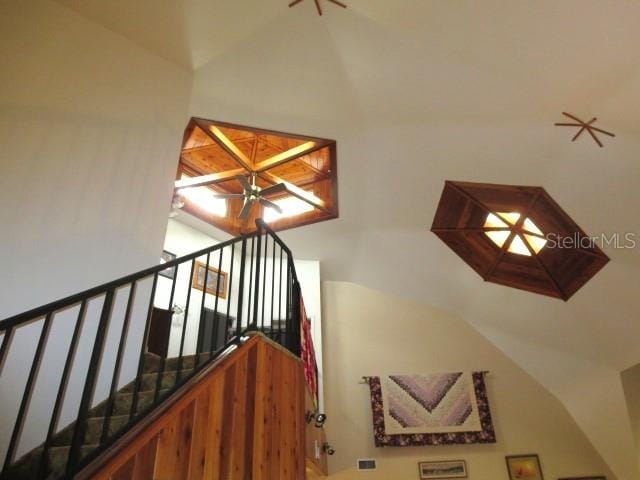 stairway with ceiling fan