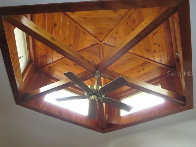 room details featuring wood walls