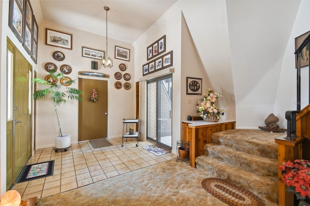 foyer entrance with tile flooring