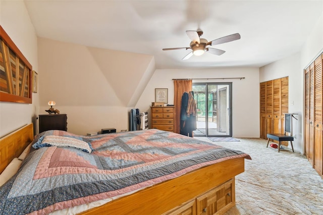 carpeted bedroom featuring ceiling fan and access to outside