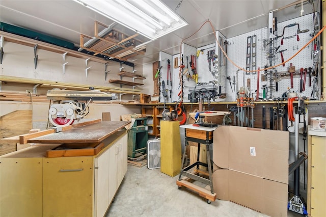 basement with a workshop area