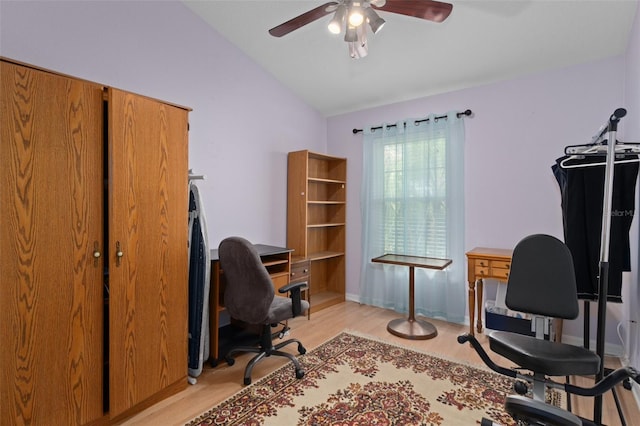 office with lofted ceiling, ceiling fan, and light wood-type flooring