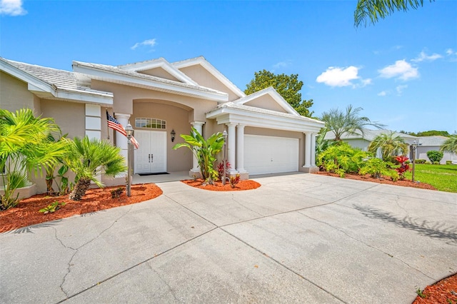 view of front of home with a garage