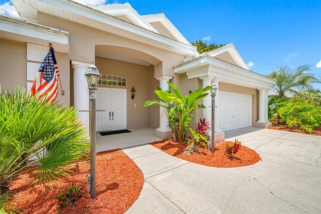 property entrance with a garage