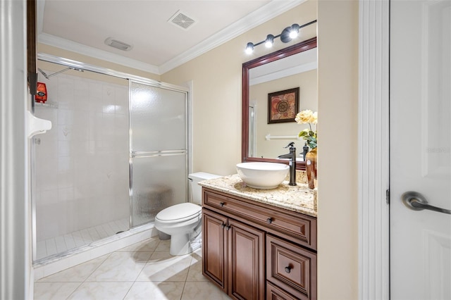 bathroom featuring crown molding, a shower with door, tile floors, toilet, and vanity