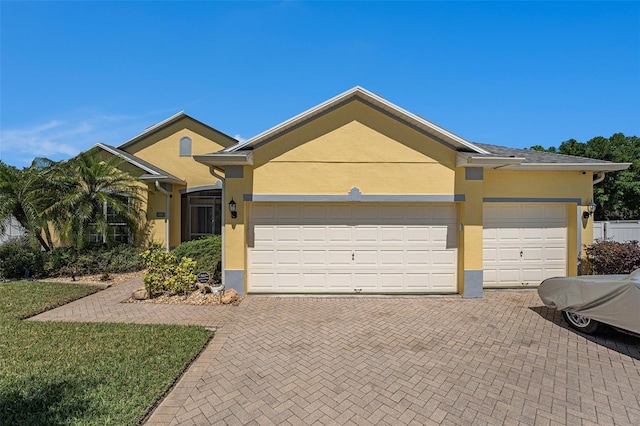 ranch-style home with a garage